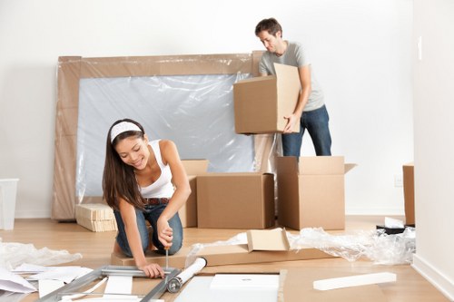 Professional office relocation services in Belsizepark with planning and moving equipment