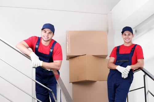 Removal crew securing furniture for transport