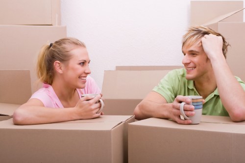 Experienced removal company preparing furniture for transport