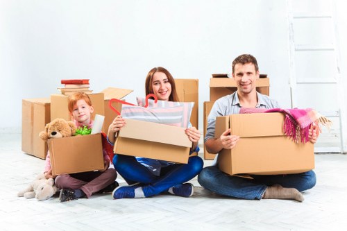 Specialist movers handling fragile items during a relocation
