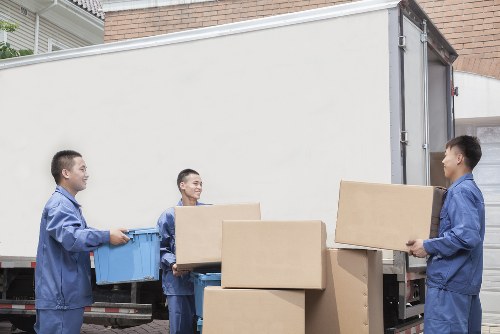 Office removals planning in Belsizepark with boxes and workspace setup