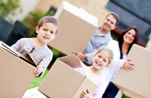Removal team handling loading for a London house relocation